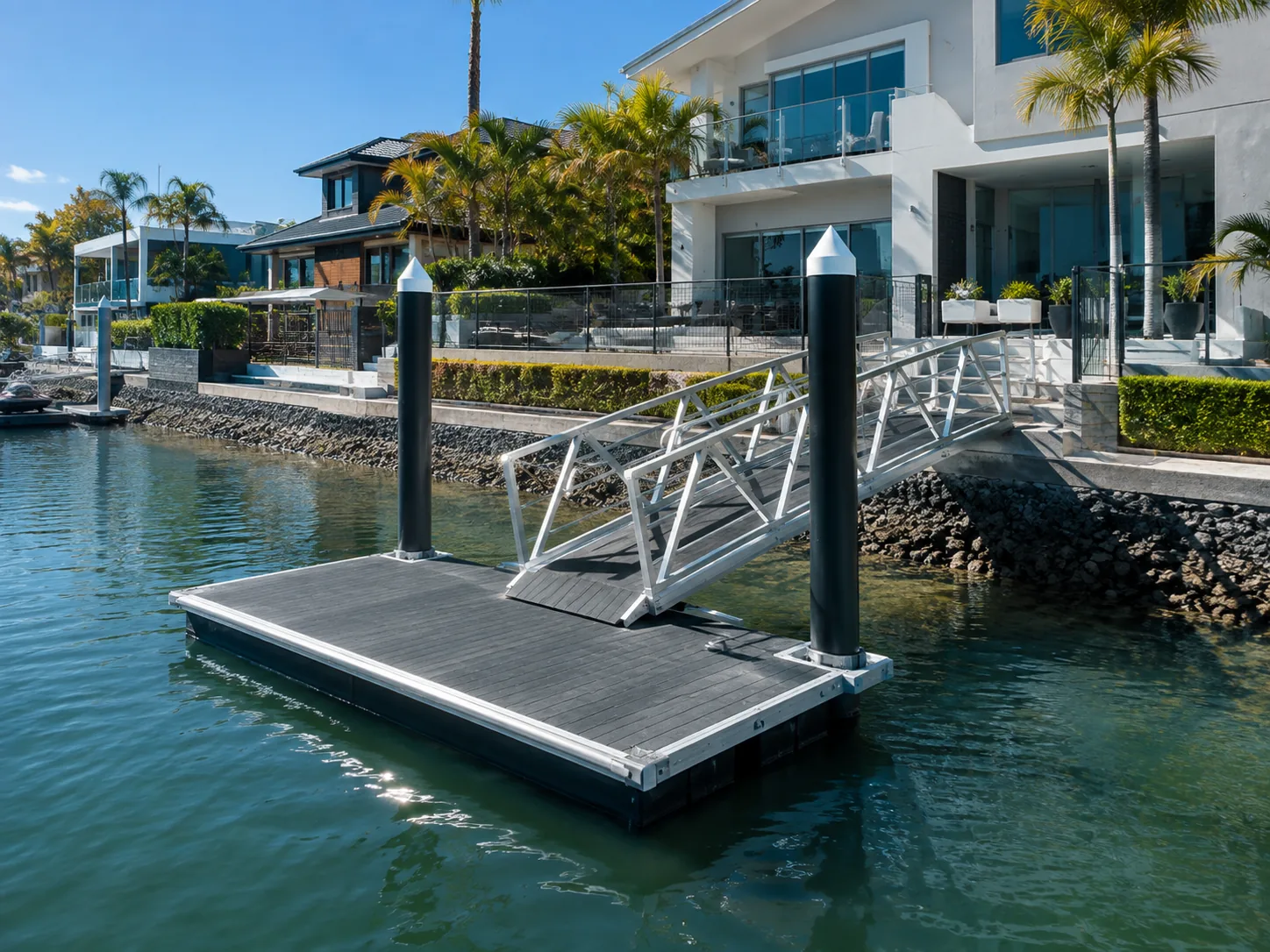 Residential pontoon, gangway and jetty on a Gold Coast style canal